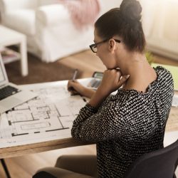 Rear view of busy woman at the office